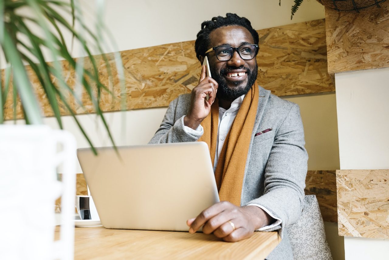Business owner reviewing credit card processing fees on a laptop
